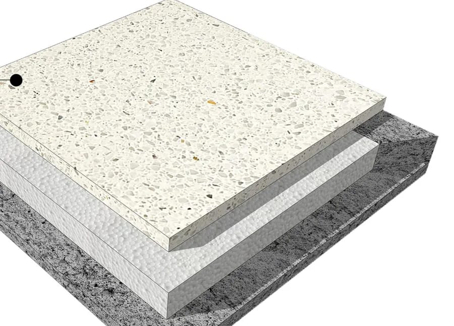 Cutaway of a premium terrazzo heat insulation tile: a white terrazzo face over expanded polystyrene over foam concrete