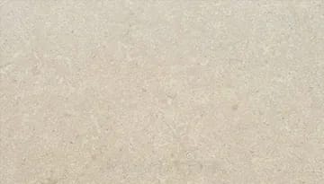 Plain pigmented cement tile in warm beige, matte and unaggregated