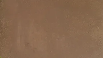 Plain pigmented cement tile in mid brown, matte and unaggregated