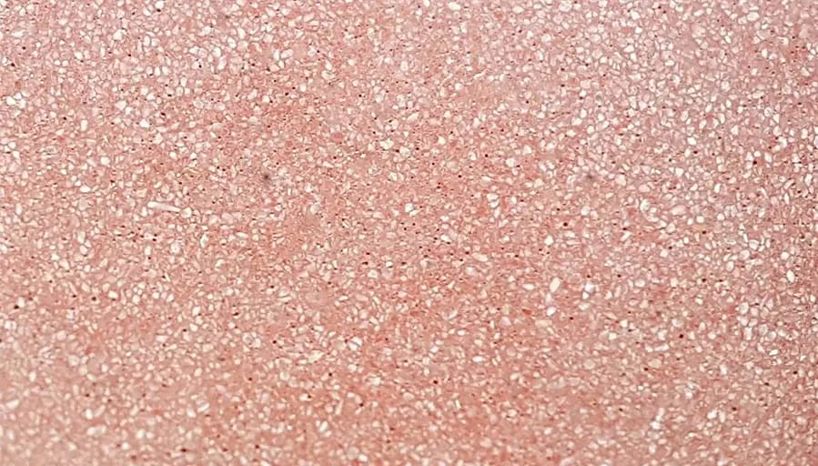 Fine pink exposed aggregate paving with white flecks