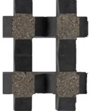 Wet cast screen block WCS-7001, crossed bars forming an open lattice, the joints showing exposed aggregate against near black concrete