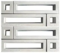Wet cast screen block WCS-7008, long horizontal slots stepped and offset across the face, in white concrete