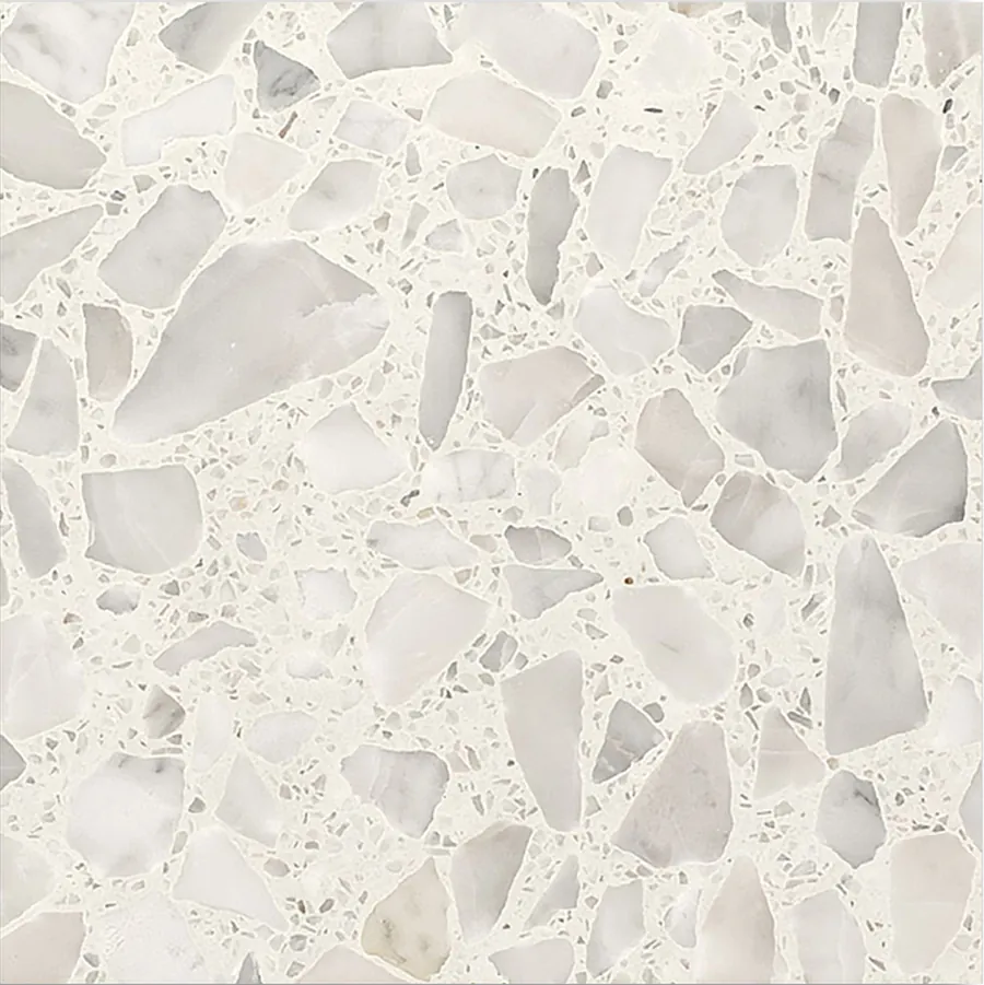 Polished terrazzo plate on a white base with large pale marble chips ground flat and honed