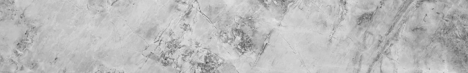 Grey marble slab with soft directional veining running across the face