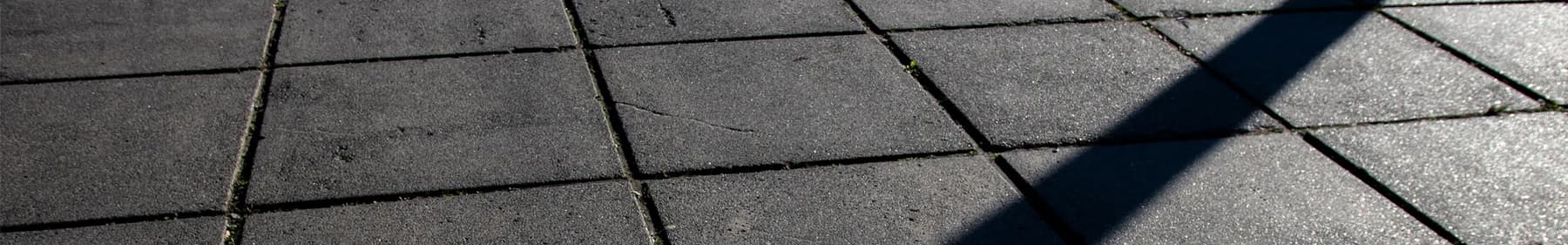 Interlocking concrete driveway paving laid in a running bond